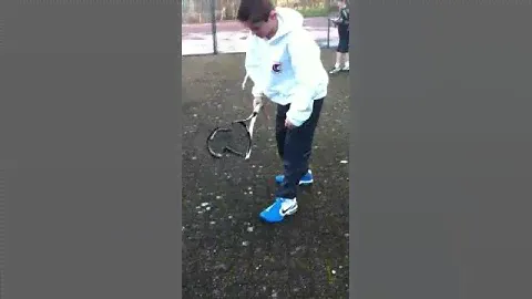 Me smashing a tennis racket